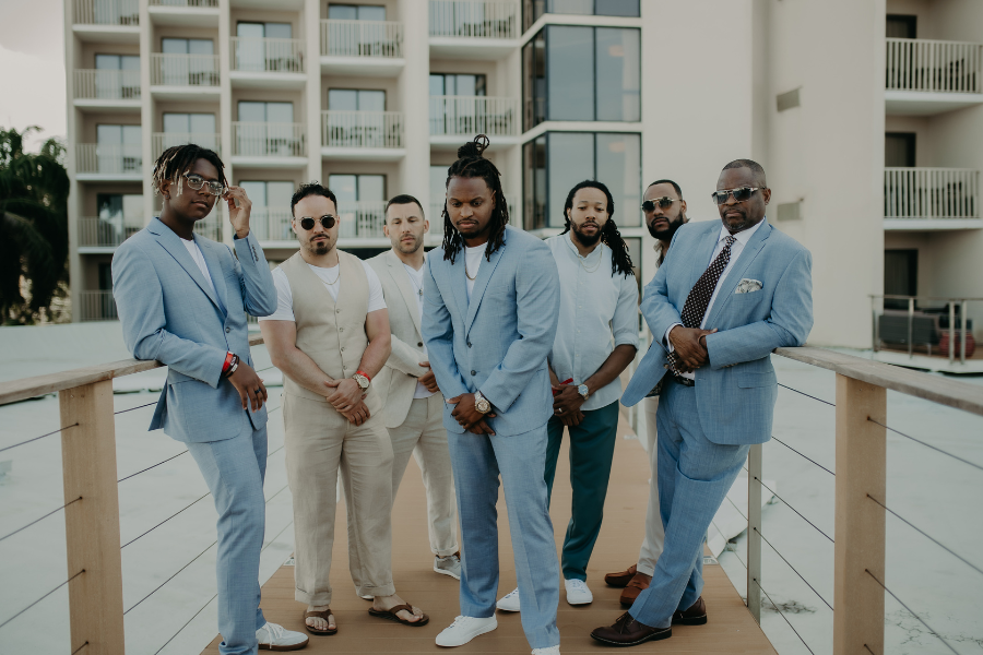 People are together in stylish suits People are together in stylish suits
