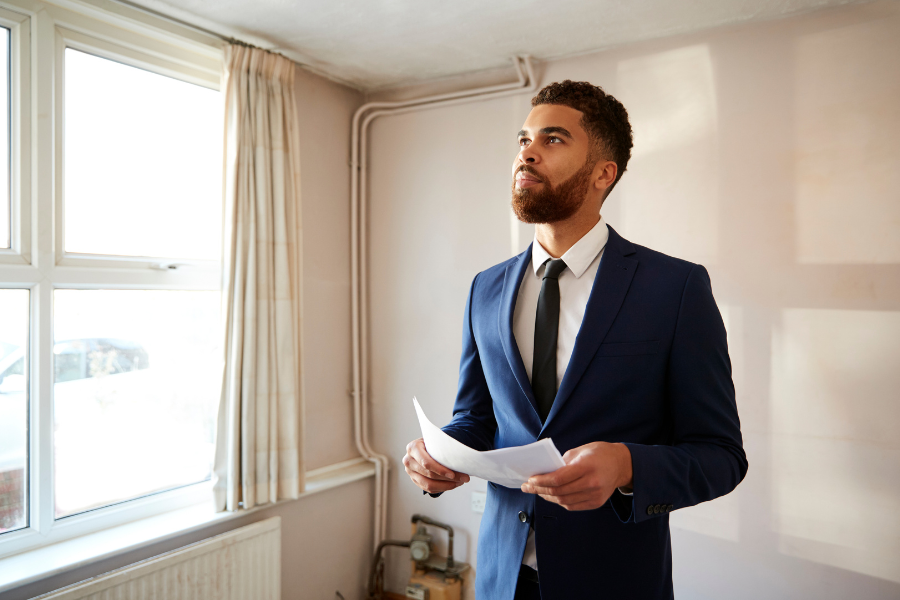 A blazer-wearing male A blazer-wearing male